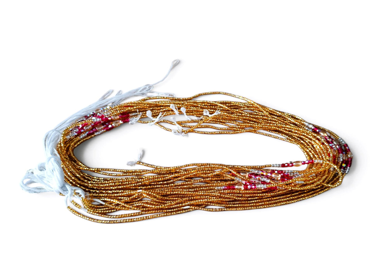 Waistbeads goud en fuchsia