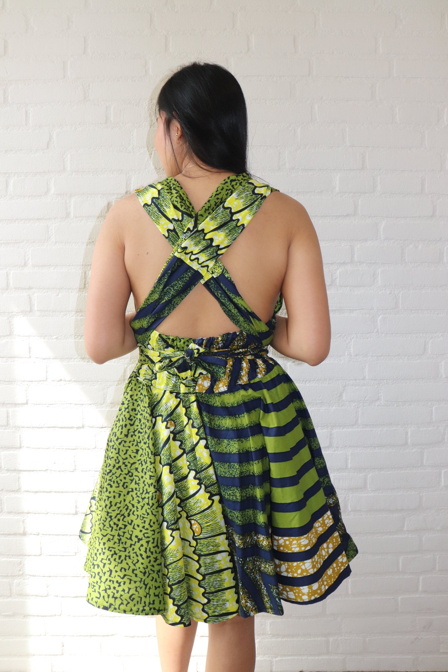 Mouwloze Wikkeljurk – Groen & Navy Print