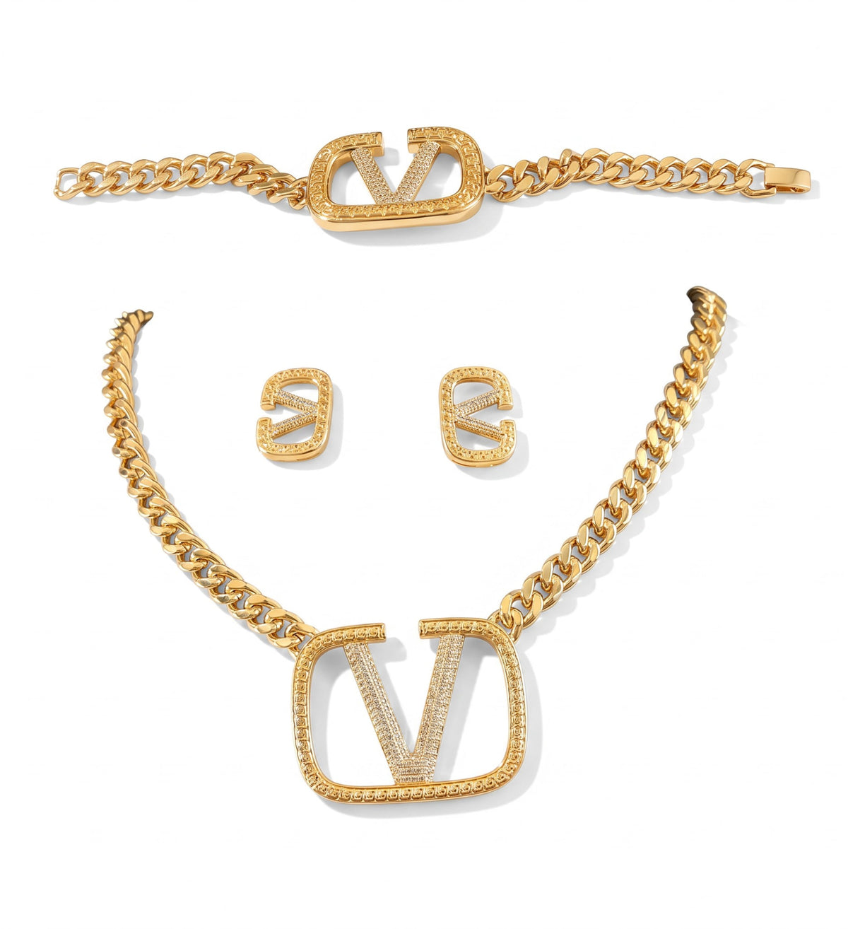 Gouden sieradenset met V-logo en kristallen, ketting, armband en oorbellen