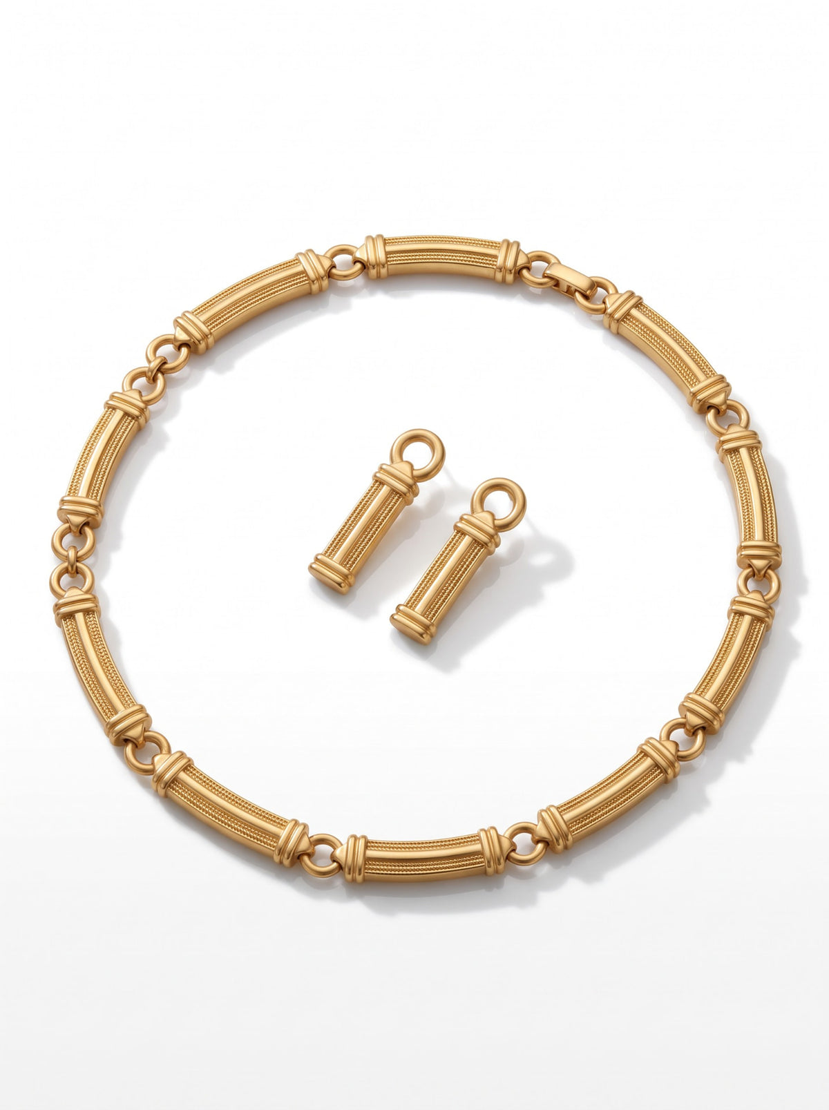 Gouden sieradenset met staafjesschakels, ketting en oorbellen