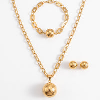Gouden sieradenset met bol hanger, armband en oorbellen