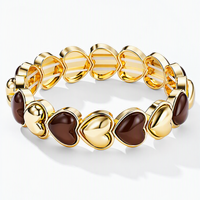 Hartjesarmband bruin en goud