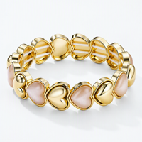 Hartjesarmband parelmoer en goud