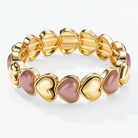 Hartjesarmband zachtroze en goud