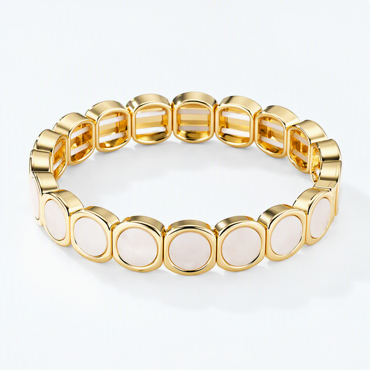 Elastische armband met parelmoer beige ronde schakels en goud