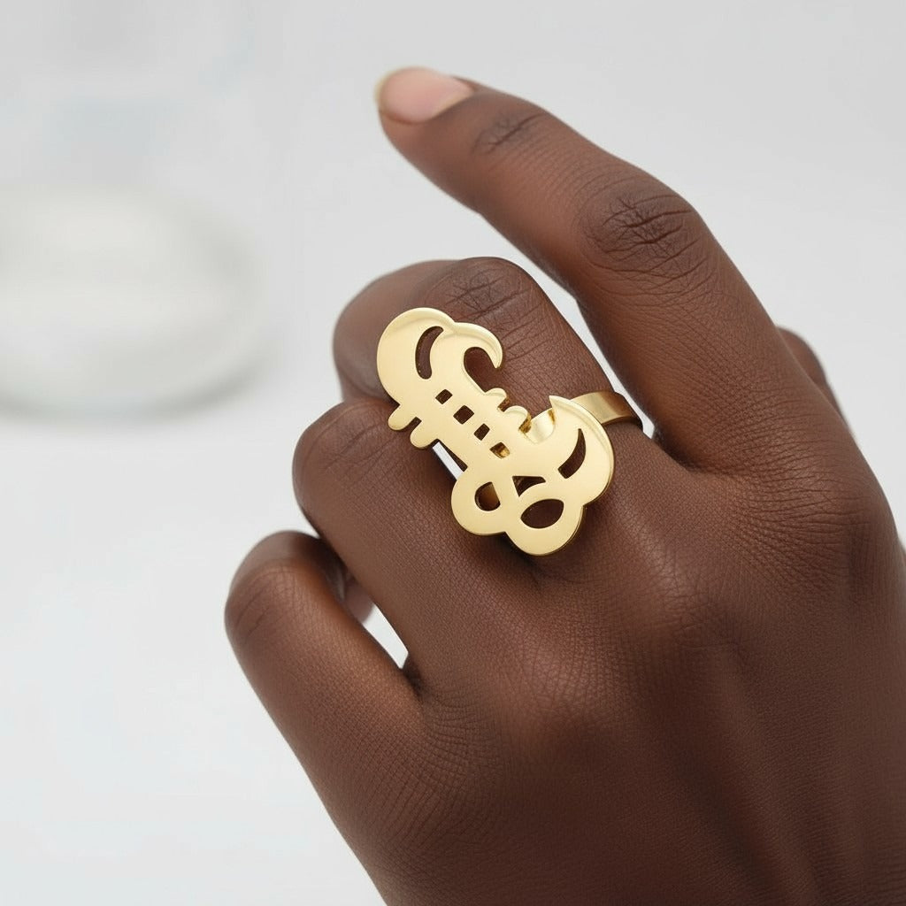 Adinkra stijl ring – goudkleurig – verstelbaar