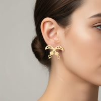 Akofena oorbellen – Adinkra symbool – goudkleurig