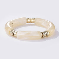 Glanzende schakelarmband beige