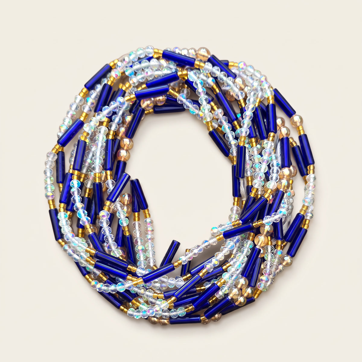 Kobaltblauwe waistbeads met iriserende kralen en goudkleurige details