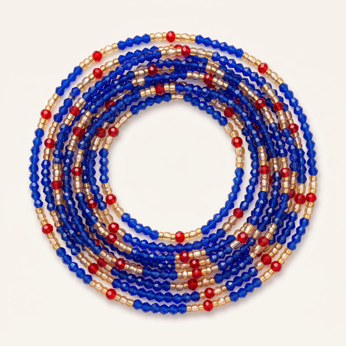 Kobaltblauwe waistbeads met rode en goudkleurige kralen