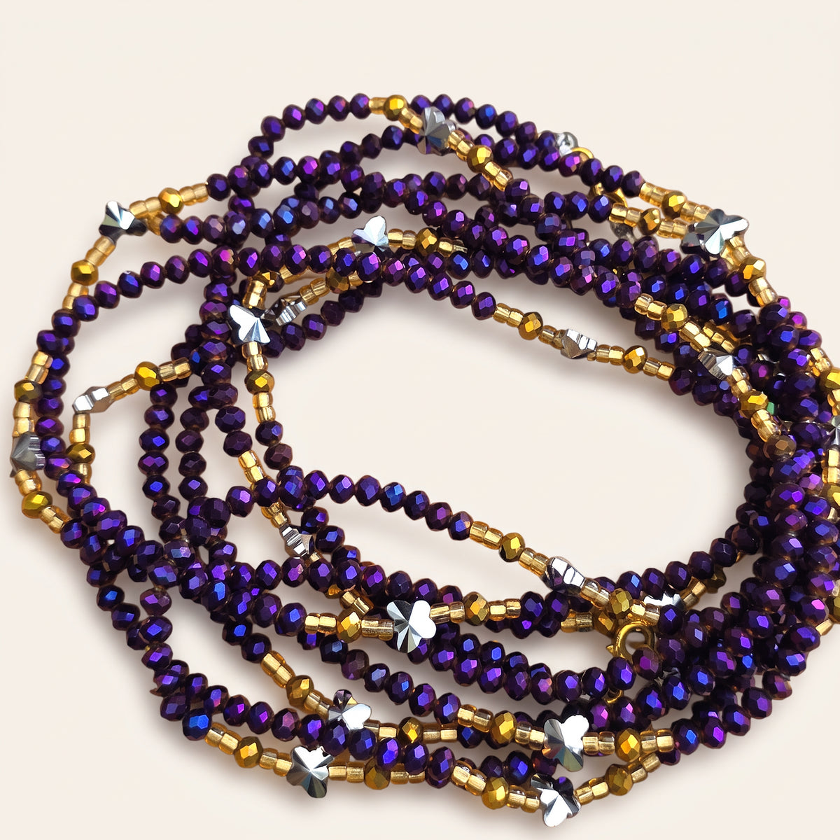 Paarse waistbeads met goudkleurige en zilverkleurige details